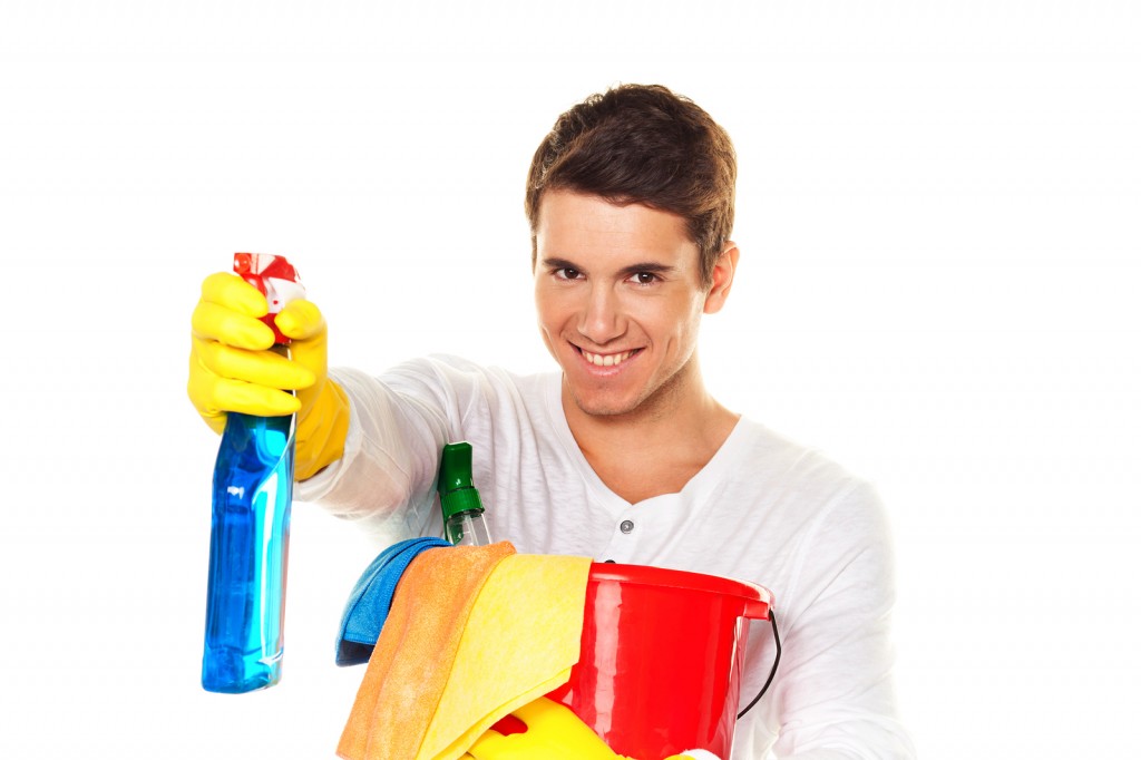 man with cleaning fluid. cleaning the apartment. hausmannbei apa